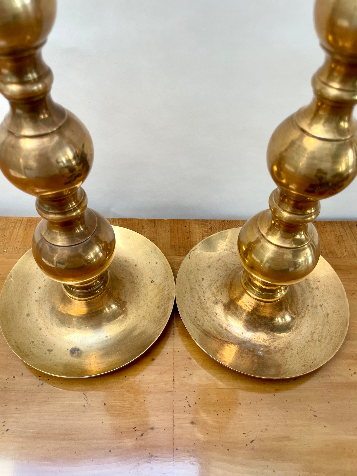 Tall brass mid century candlesticks in the Moroccan style