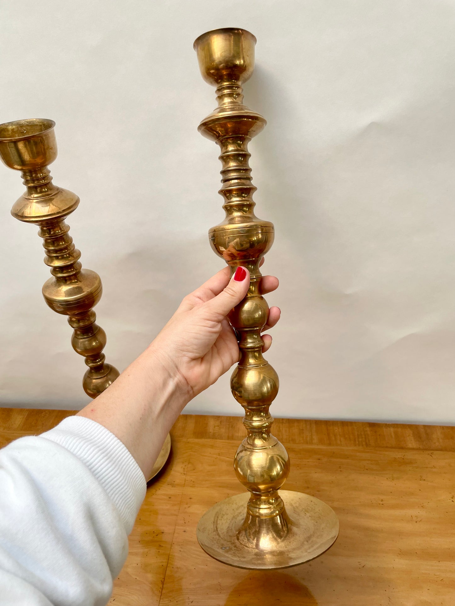 Tall brass mid century candlesticks in the Moroccan style