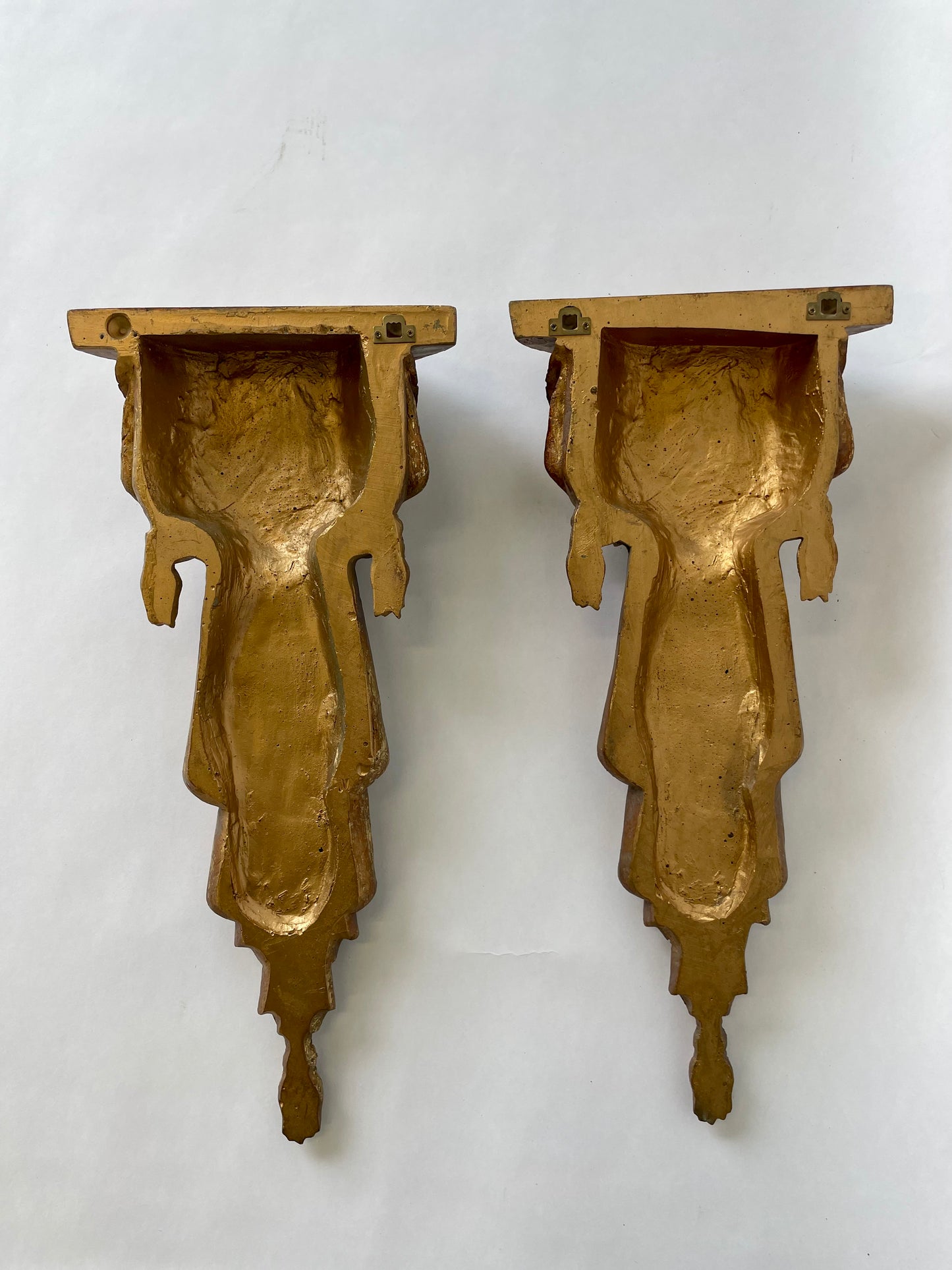 Pair of wood sconce shelves with gold gilding, swags and tassels