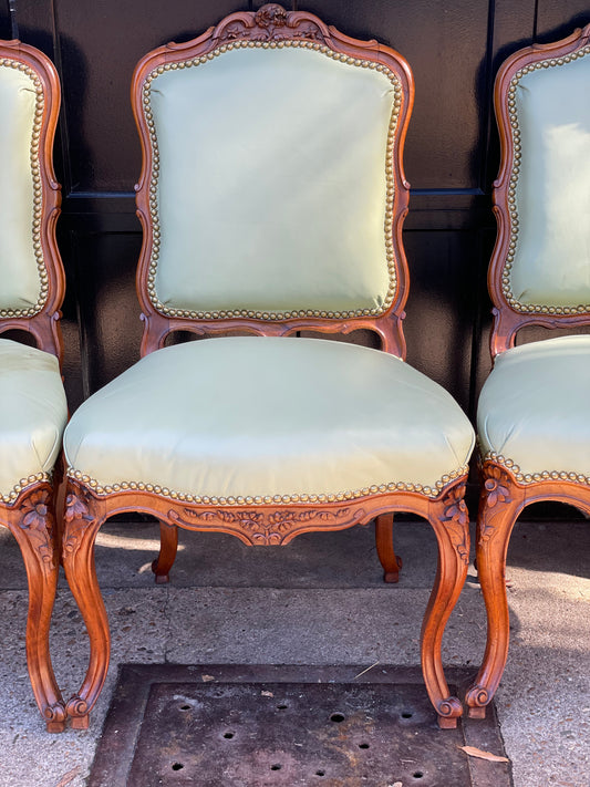 Antique chairs upholstered in pistachio leather, Louis XV