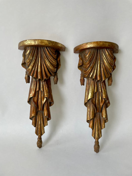Pair of wood sconce shelves with gold gilding, swags and tassels
